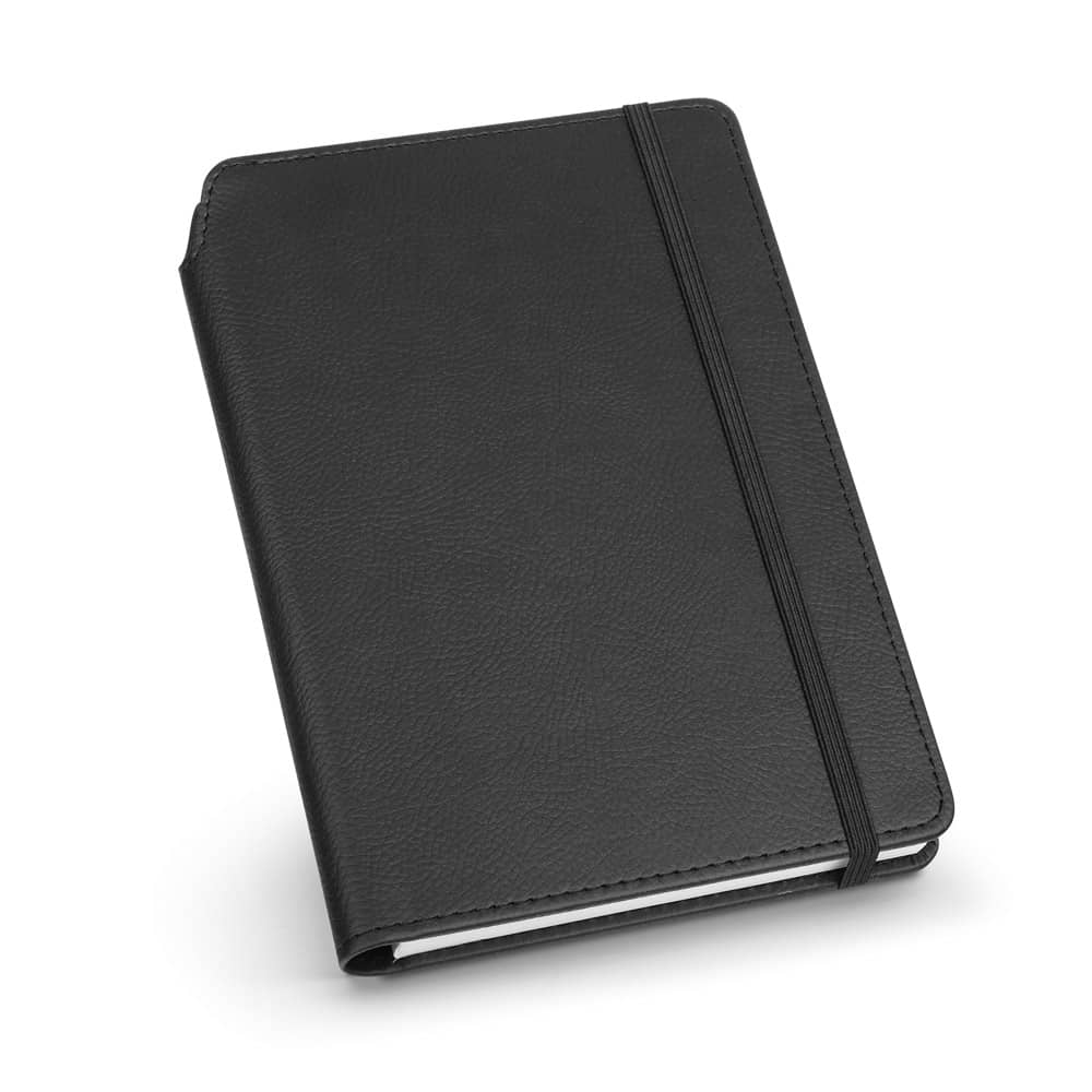 Caderno A5 de capa dura em c.sintético com páginas pautadas