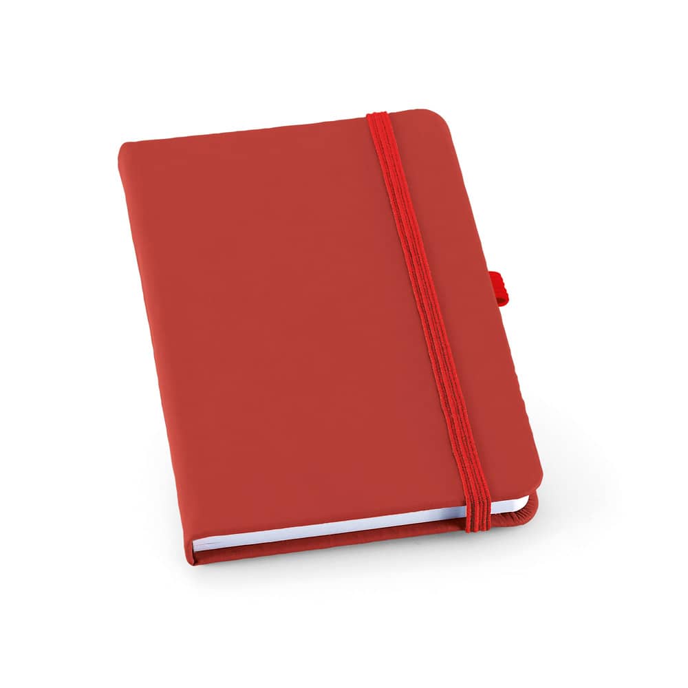 Caderno A6 de capa dura em c.sintético com páginas pautadas